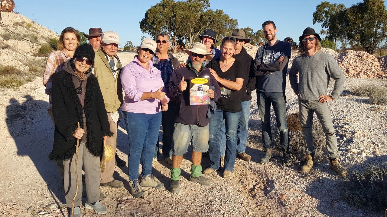 Jenni Brammall (black shirt), fossil hunters and opal miner Butch McFadden, during the Lightning Ridge Fossil Dig. Photograph: Australian Opal Centre Opal miners
